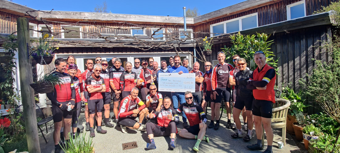 BG&E presenting a cheque to Force Cancer Charity at a Cadence Café